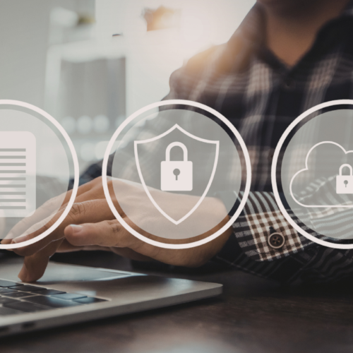 A person typing on a laptop with three logos on top of the image: a document, a padlock on a shield, and a padlock on a cloud.