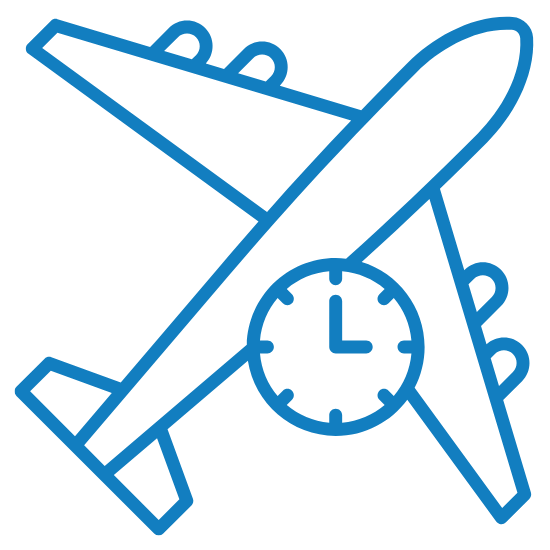 An airplane next to a clock.