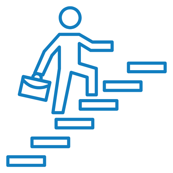 A person holding a briefcase walking up a set of stairs.