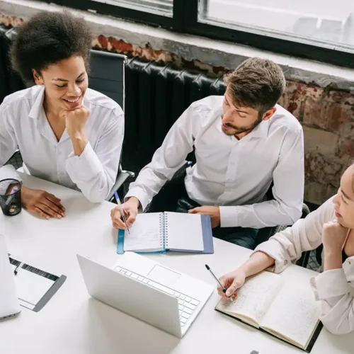 A team of professionals developing their business’s cyber incident response plan.