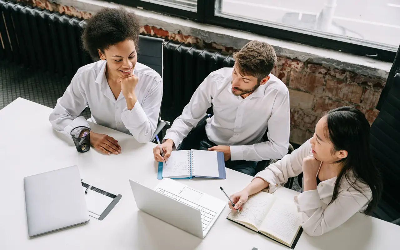 A team of professionals developing their business’s cyber incident response plan.
